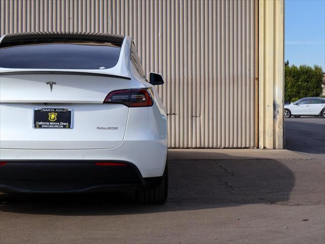 used 2021 Tesla Model Y car, priced at $29,299