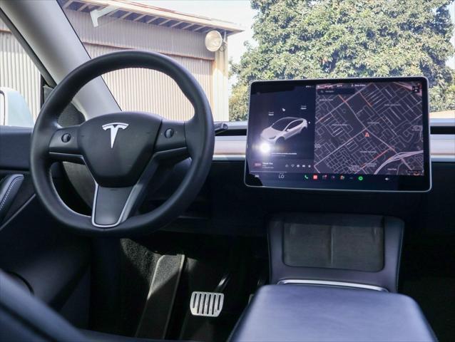 used 2021 Tesla Model Y car, priced at $29,299