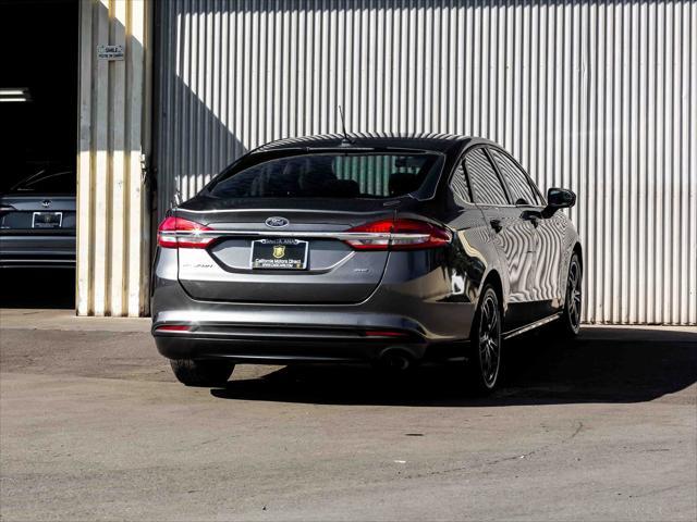 used 2018 Ford Fusion car, priced at $13,199