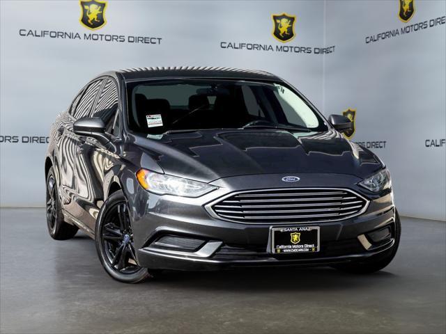 used 2018 Ford Fusion car, priced at $12,303