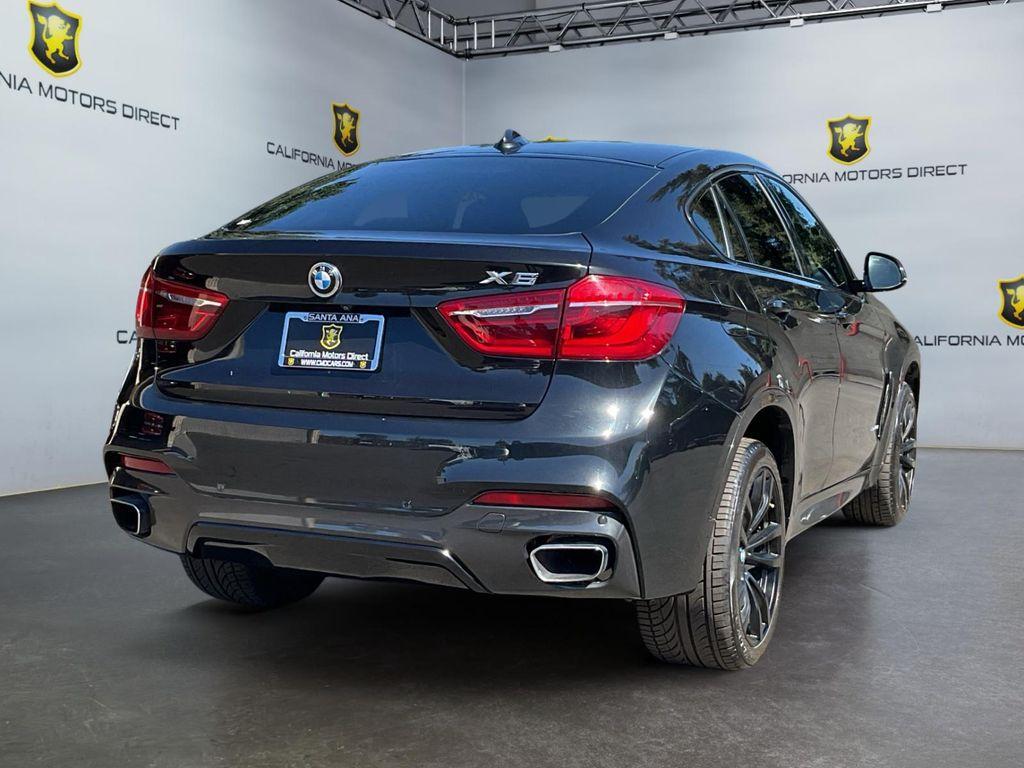 used 2019 BMW X6 car, priced at $33,699