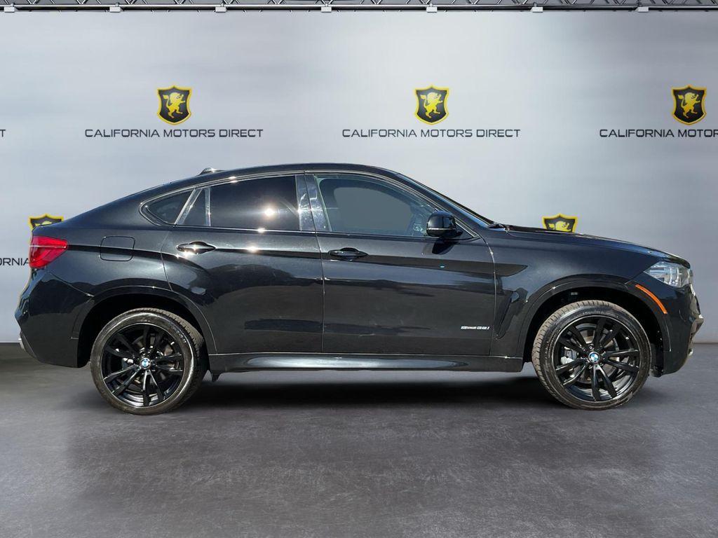 used 2019 BMW X6 car, priced at $33,699