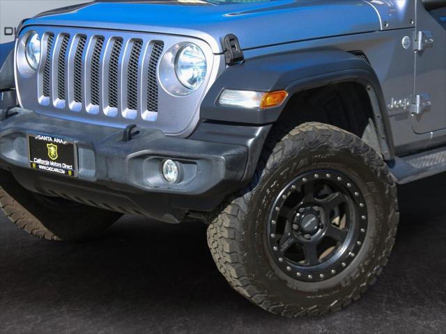 used 2018 Jeep Wrangler Unlimited car, priced at $24,716