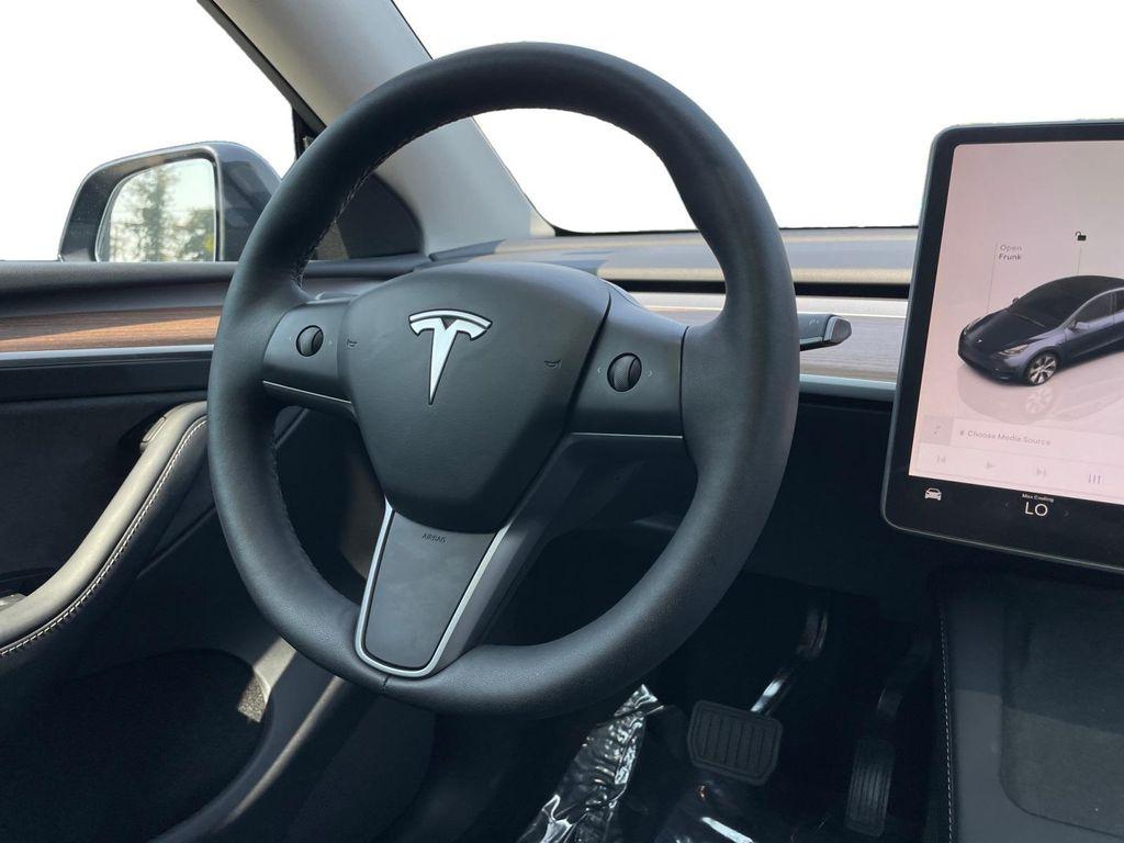 used 2024 Tesla Model Y car, priced at $33,999