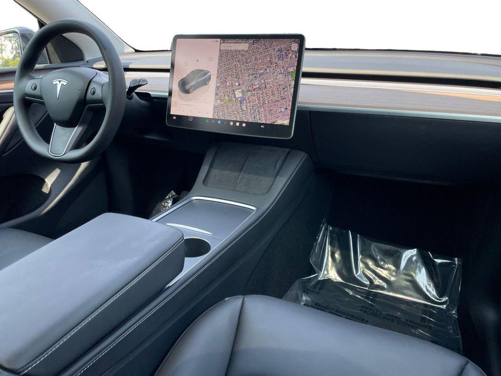 used 2024 Tesla Model Y car, priced at $33,999
