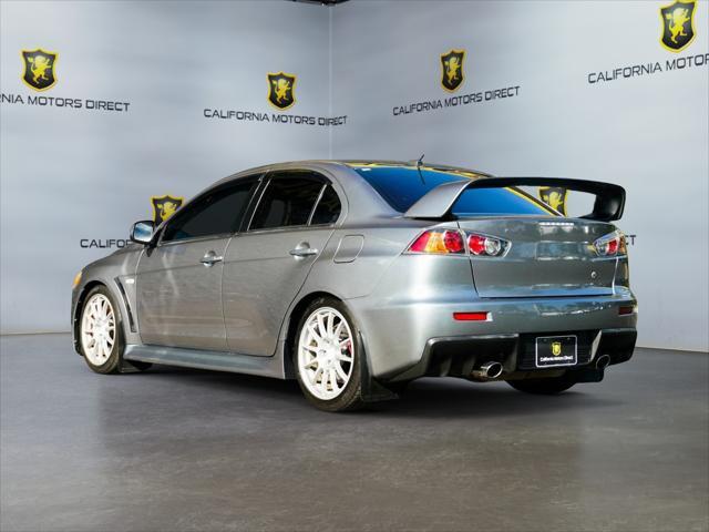 used 2013 Mitsubishi Lancer Evolution car, priced at $29,023