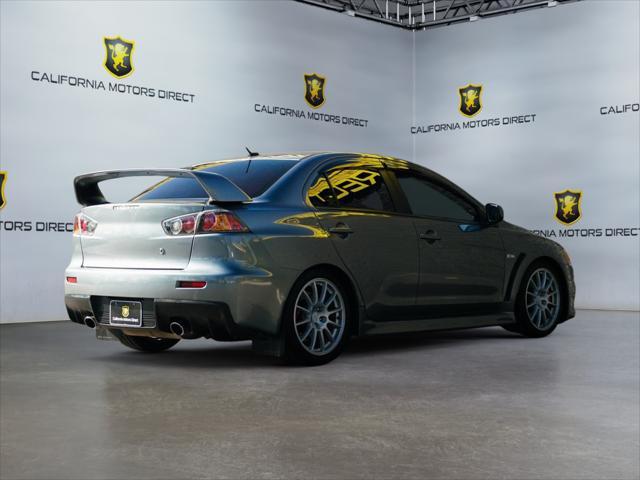 used 2013 Mitsubishi Lancer Evolution car, priced at $29,023