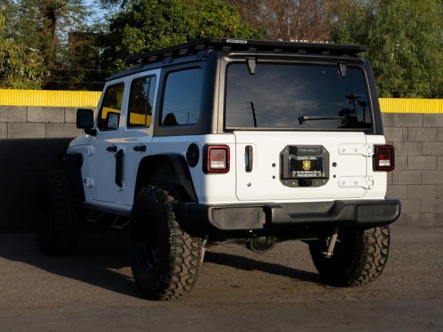 used 2018 Jeep Wrangler Unlimited car, priced at $31,057
