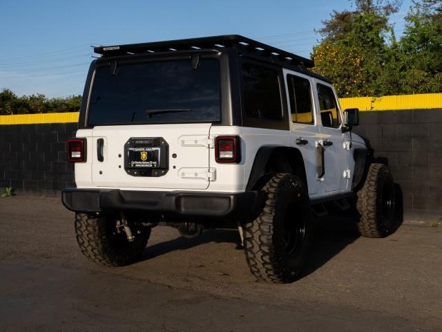 used 2018 Jeep Wrangler Unlimited car, priced at $31,057