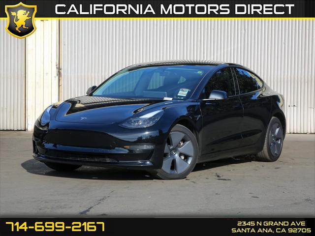 used 2022 Tesla Model 3 car, priced at $24,699