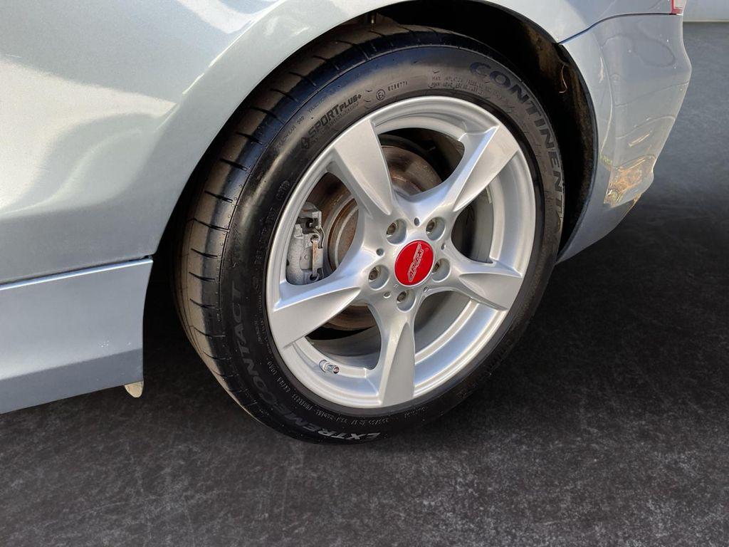 used 2012 BMW 128 car, priced at $9,999