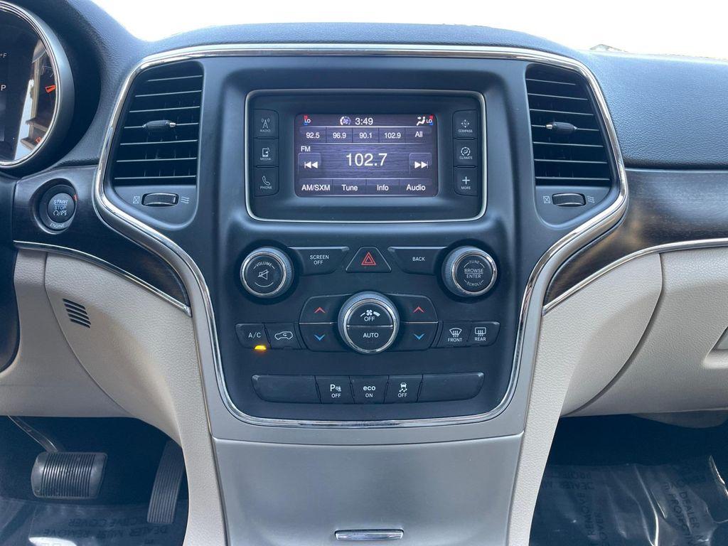 used 2014 Jeep Grand Cherokee car, priced at $14,899