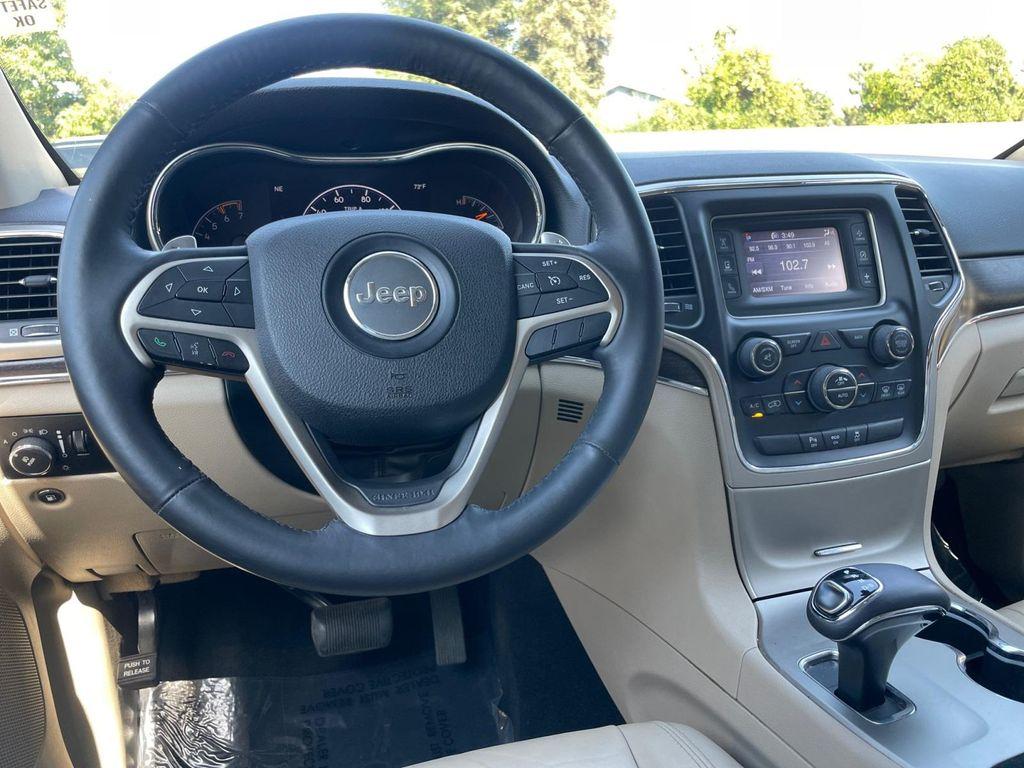 used 2014 Jeep Grand Cherokee car, priced at $14,899