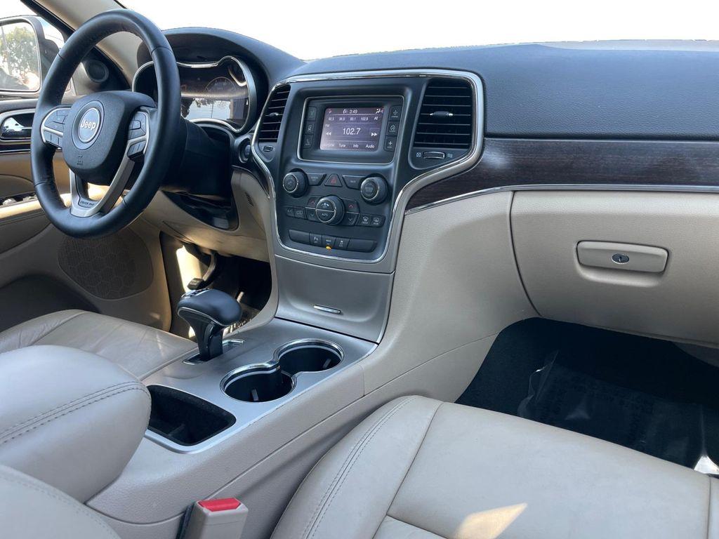 used 2014 Jeep Grand Cherokee car, priced at $14,899