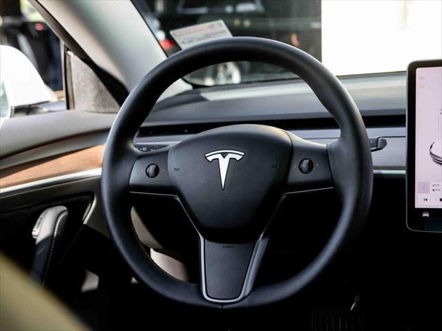 used 2022 Tesla Model 3 car, priced at $27,799