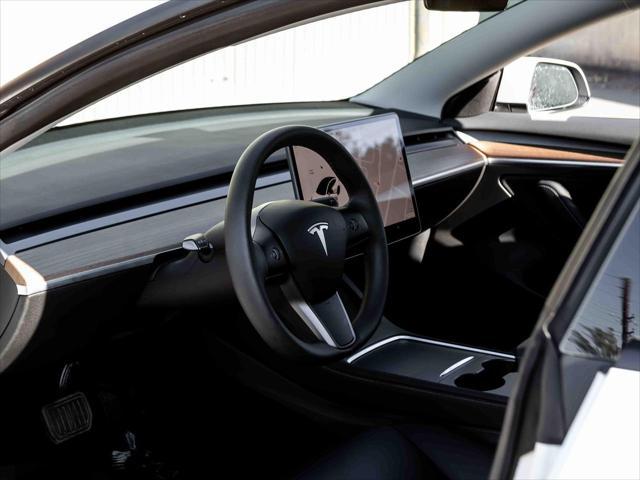 used 2022 Tesla Model 3 car, priced at $27,799