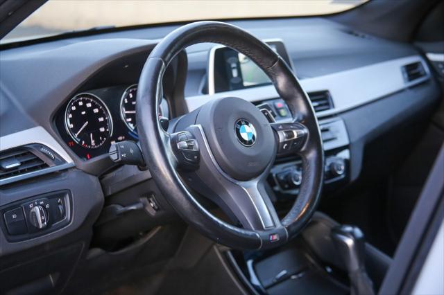 used 2018 BMW X1 car, priced at $19,699