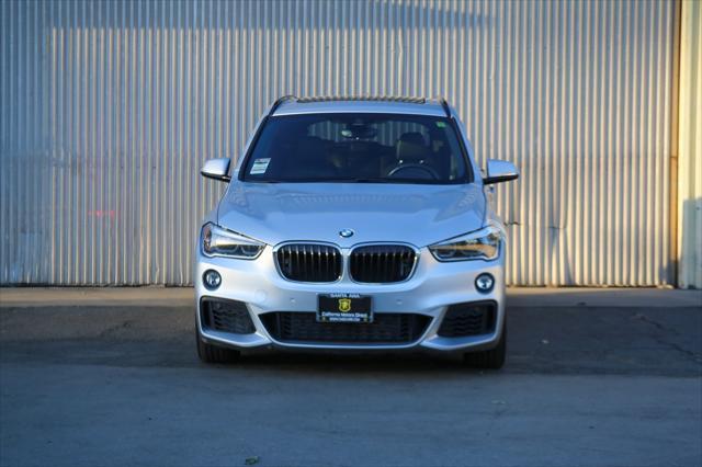 used 2018 BMW X1 car, priced at $19,699