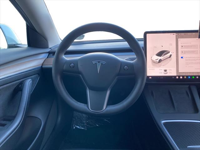 used 2023 Tesla Model 3 car, priced at $24,899