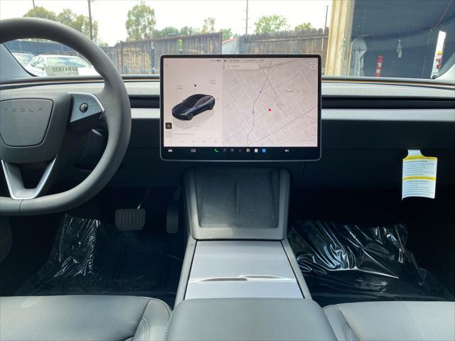 used 2025 Tesla Model 3 car, priced at $37,599