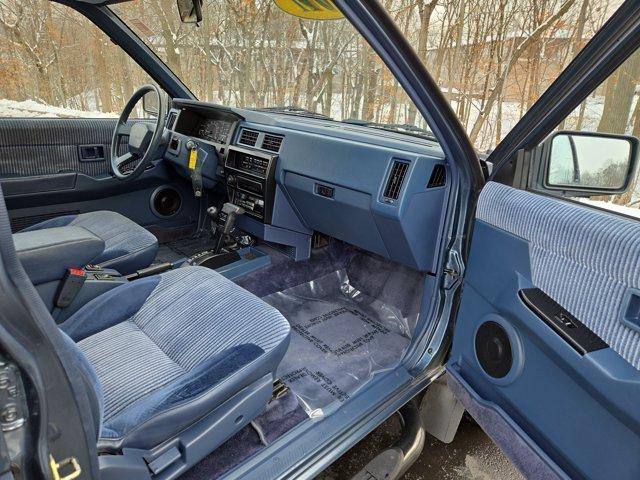 used 1991 Nissan Pathfinder car, priced at $14,500