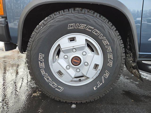 used 1991 Nissan Pathfinder car, priced at $14,500