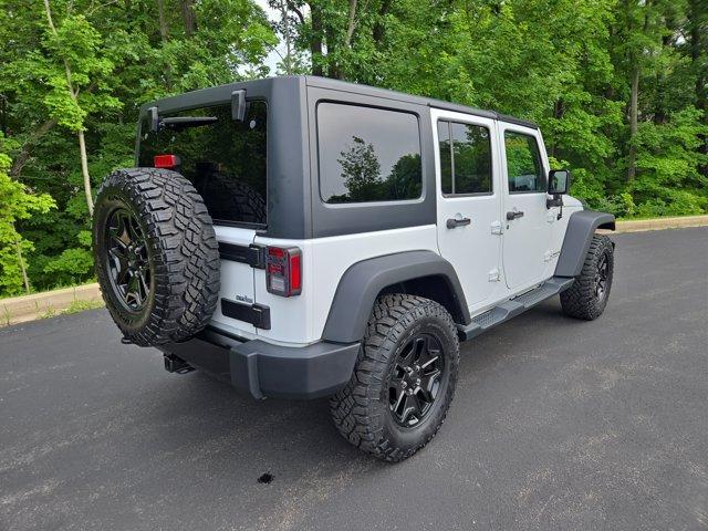 used 2015 Jeep Wrangler Unlimited car, priced at $18,990