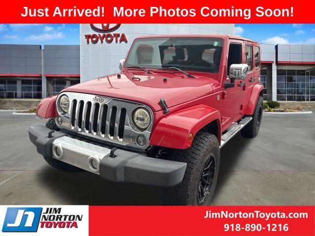 used 2014 Jeep Wrangler Unlimited car, priced at $15,556