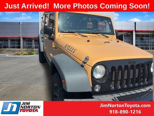 used 2014 Jeep Wrangler Unlimited car, priced at $15,975