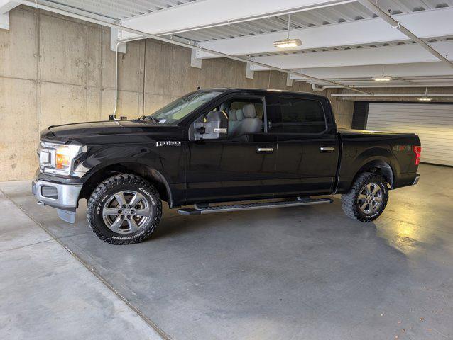 used 2018 Ford F-150 car, priced at $23,301
