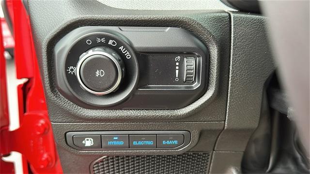 used 2024 Jeep Wrangler 4xe car, priced at $33,998