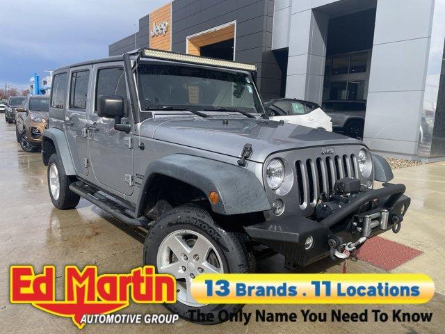 used 2014 Jeep Wrangler Unlimited car, priced at $18,592