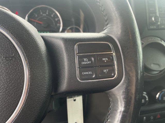 used 2014 Jeep Wrangler Unlimited car, priced at $16,897