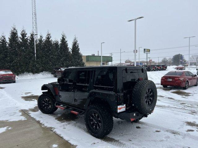 used 2015 Jeep Wrangler Unlimited car, priced at $22,391