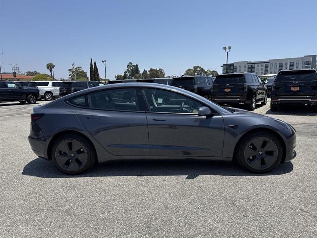used 2023 Tesla Model 3 car, priced at $28,397