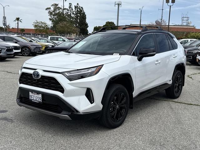 used 2023 Toyota RAV4 Hybrid car, priced at $38,000