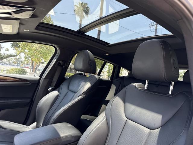 used 2023 BMW X4 car, priced at $36,000