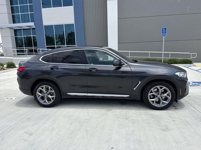used 2023 BMW X4 car, priced at $37,888