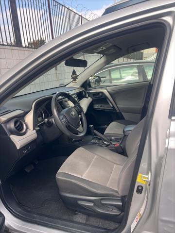 used 2013 Toyota RAV4 car, priced at $14,500