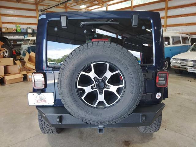 used 2013 Jeep Wrangler Unlimited car, priced at $13,195