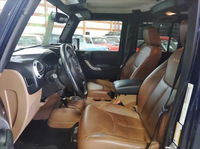used 2013 Jeep Wrangler Unlimited car, priced at $13,195