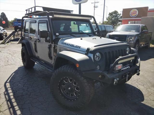 used 2014 Jeep Wrangler Unlimited car, priced at $19,995