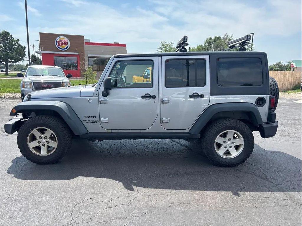 used 2013 Jeep Wrangler Unlimited car, priced at $12,395