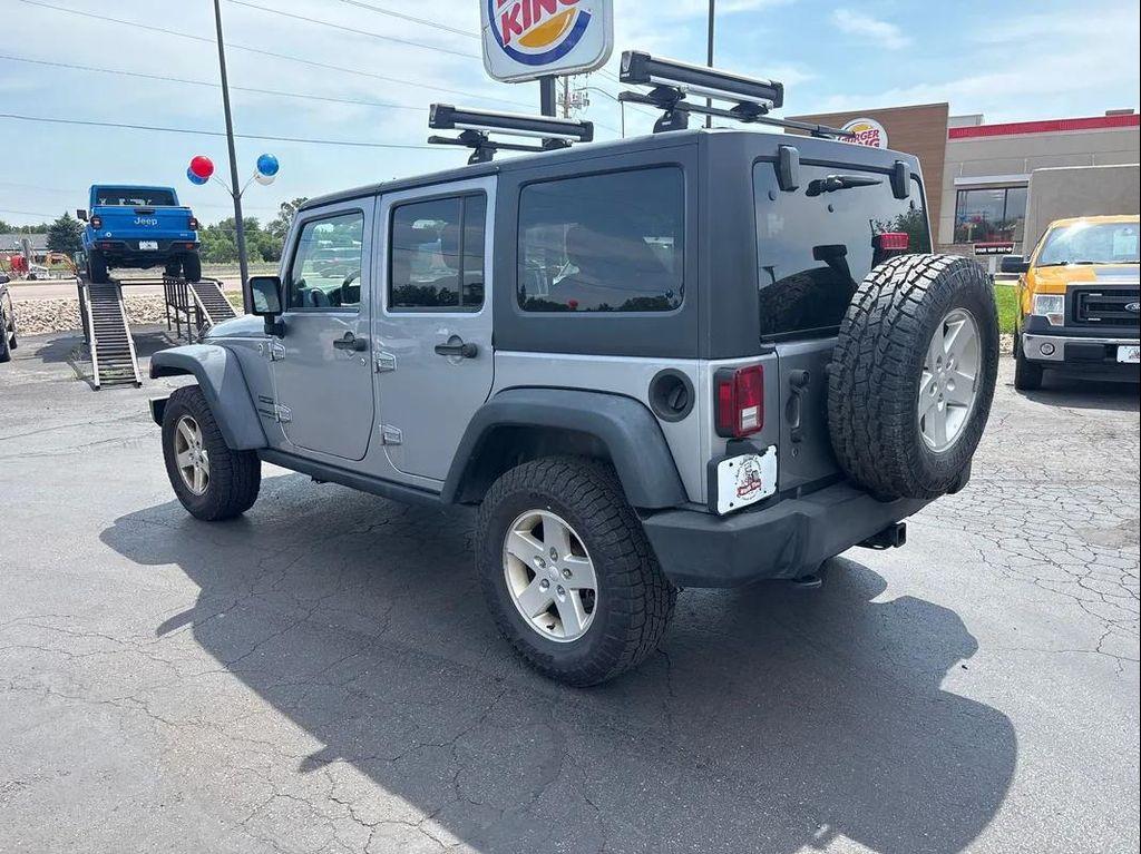 used 2013 Jeep Wrangler Unlimited car, priced at $12,395