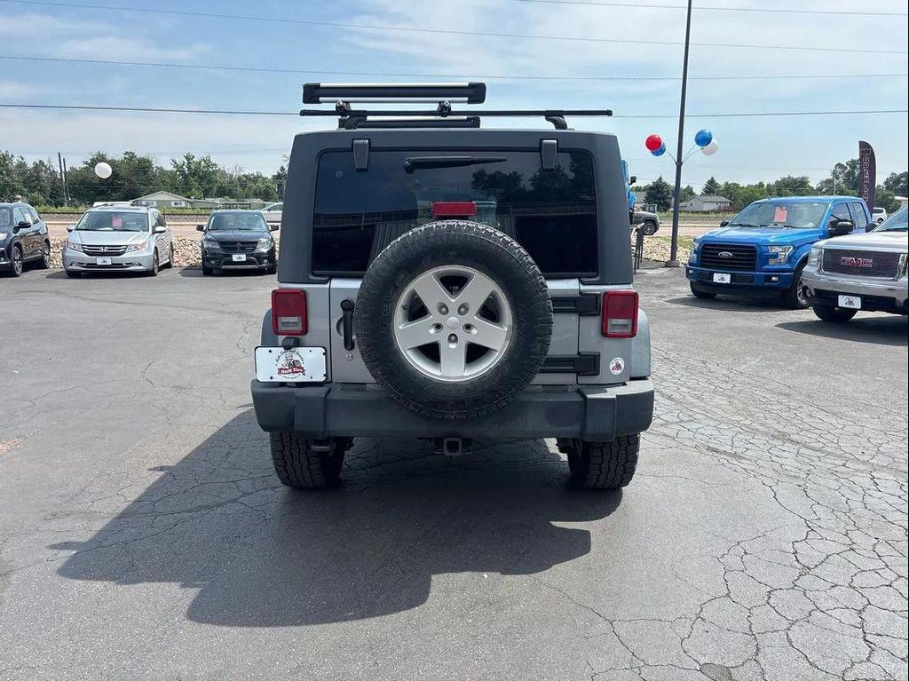used 2013 Jeep Wrangler Unlimited car, priced at $12,395
