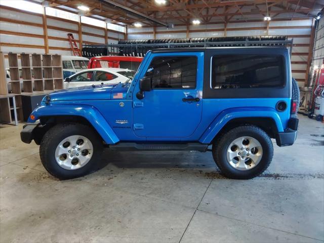 used 2015 Jeep Wrangler car, priced at $19,395