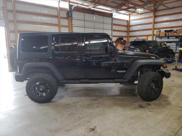 used 2015 Jeep Wrangler Unlimited car, priced at $19,595