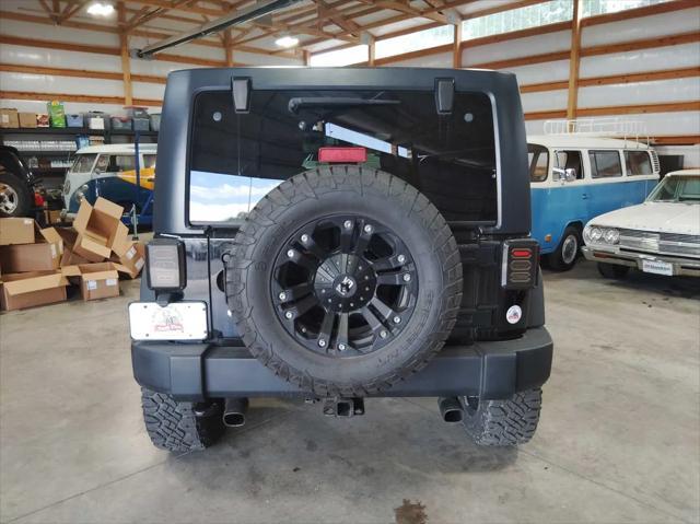 used 2015 Jeep Wrangler Unlimited car, priced at $19,595