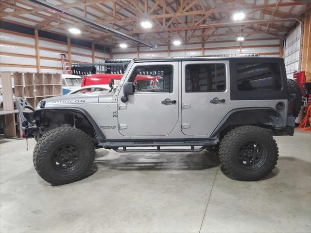 used 2013 Jeep Wrangler Unlimited car, priced at $22,995