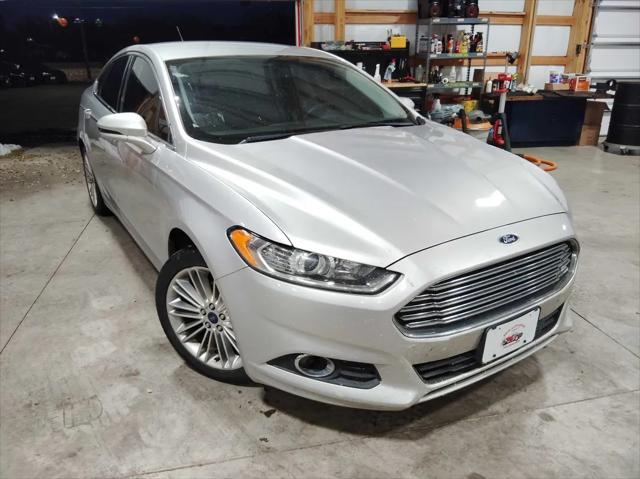 used 2016 Ford Fusion car, priced at $11,995